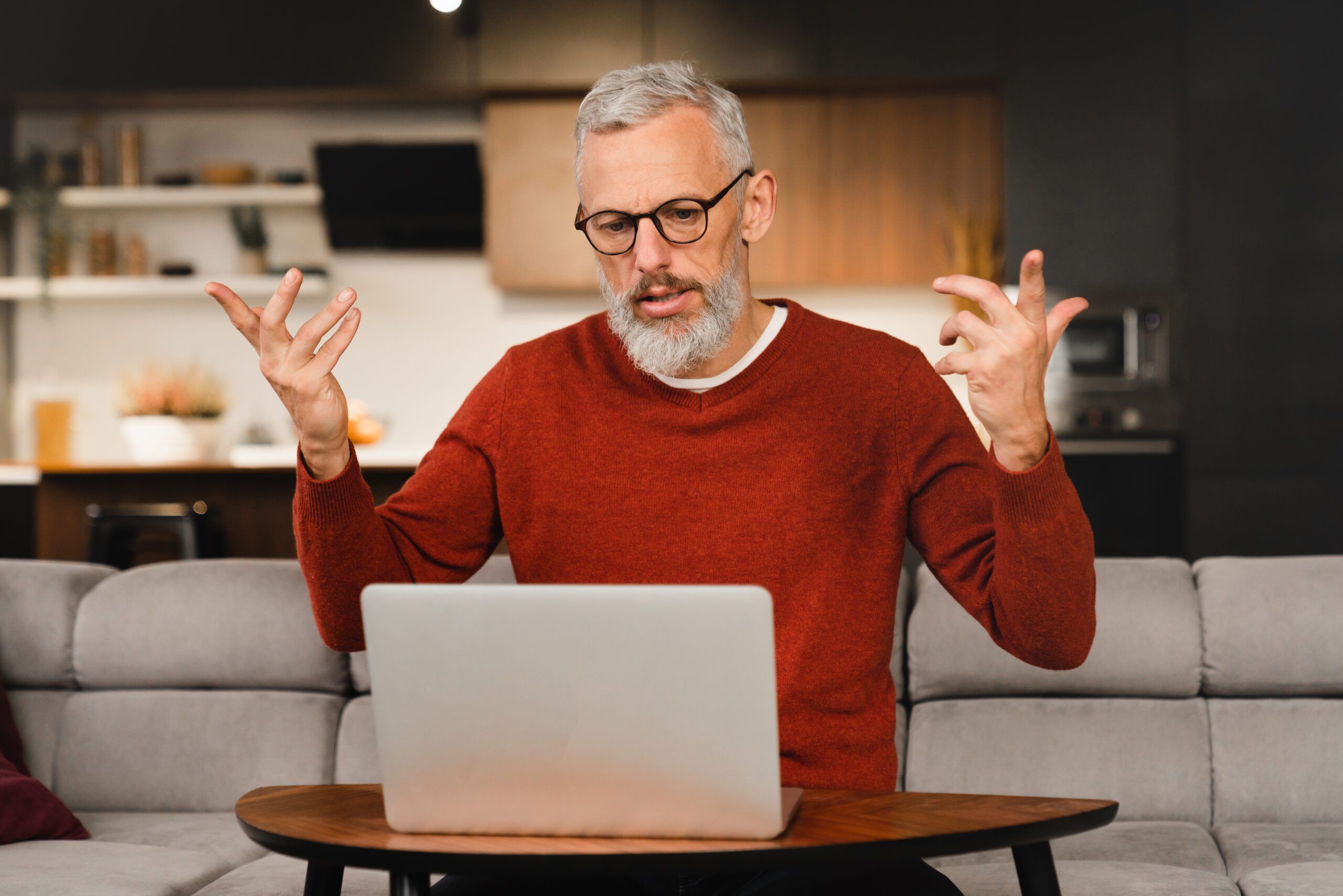 man annoyed by slow laptop leaning how to fix it